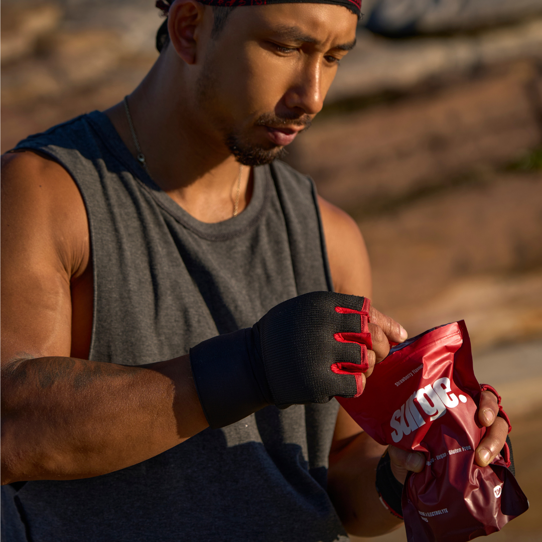 Close-up of a single green leaf against a white background.