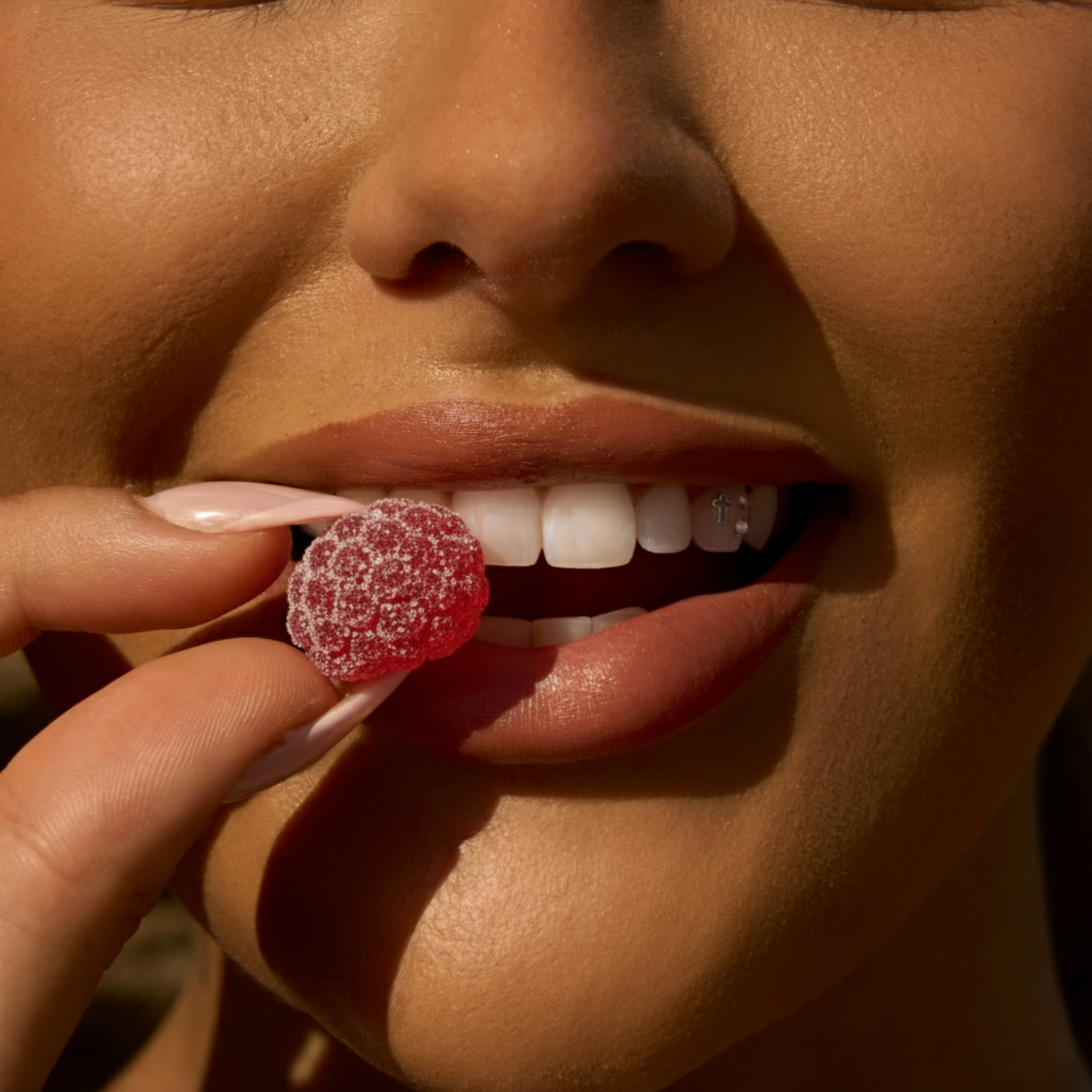 Close-up of a single green leaf against a white background.
